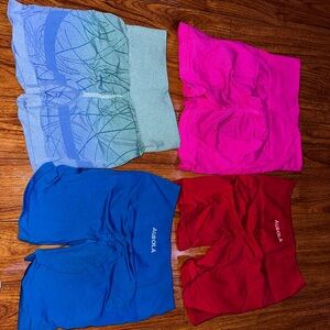 Four pairs of gym shorts with butt scrunch